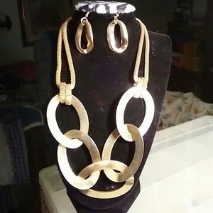 Goldtone necklace with matching earrings